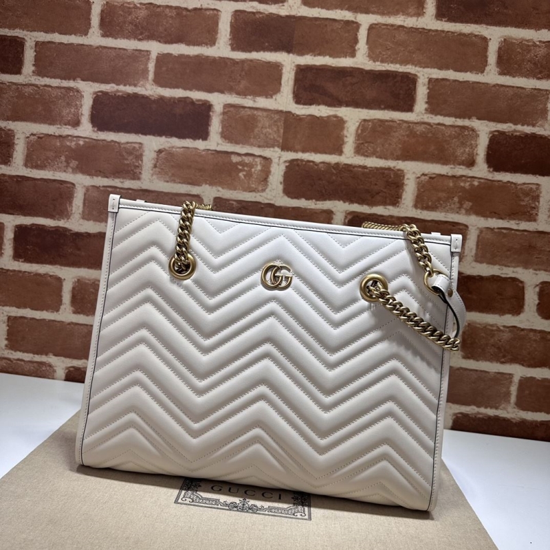 G*u*i shopping bags